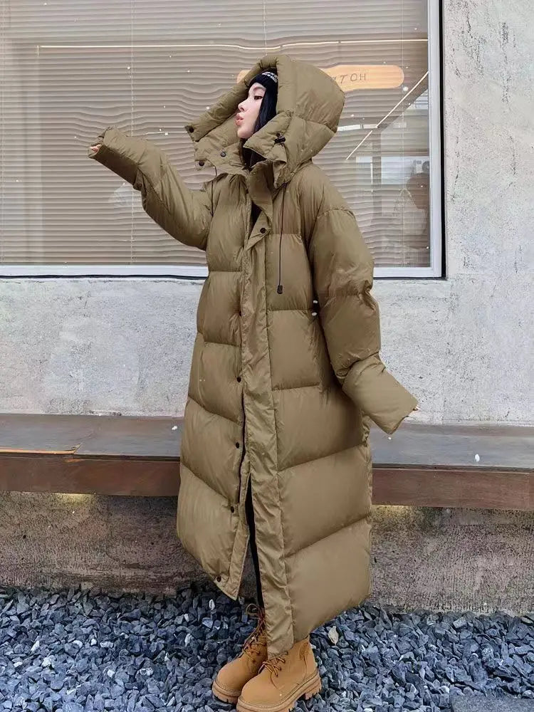 Long Women's Winter Padded Coat with Hood - Windproof and Comfortable for Cold Days