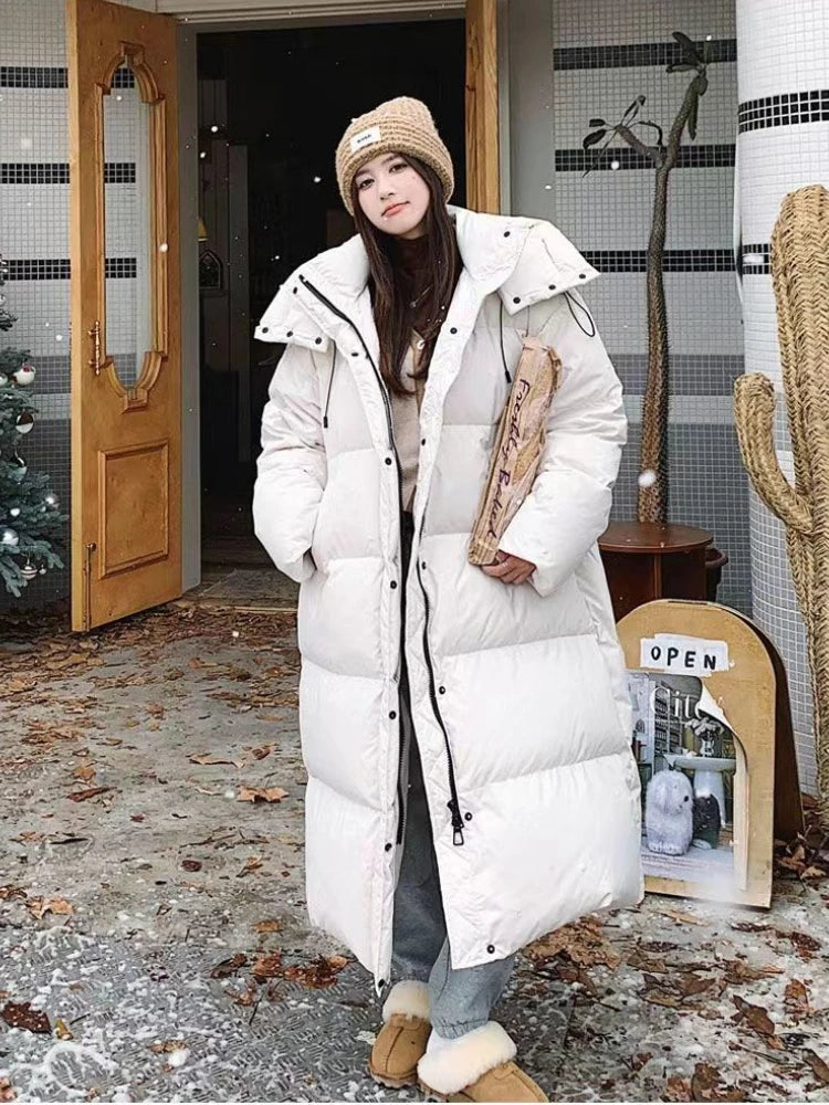 Long Women's Winter Padded Coat with Hood - Windproof and Comfortable for Cold Days