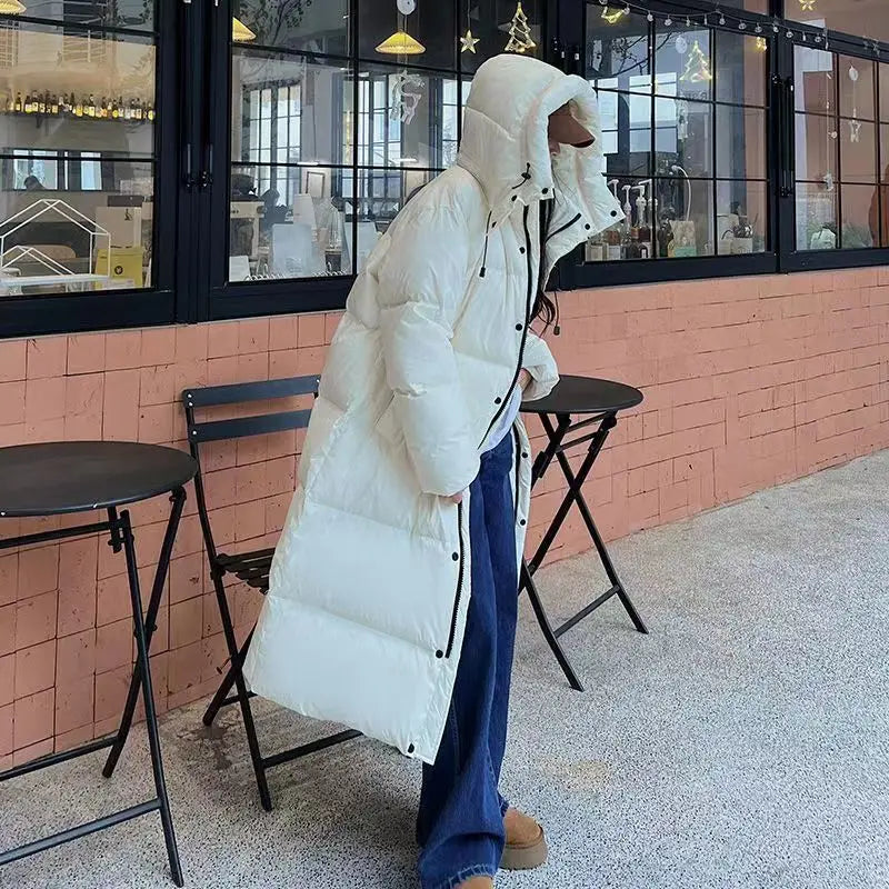 Long Women's Winter Padded Coat with Hood - Windproof and Comfortable for Cold Days