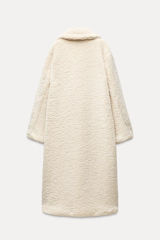 Long Winter Coat for Women Made of Soft Teddy Fabric with Lapel Collar and Side Pockets for Extra Warmth and Comfort