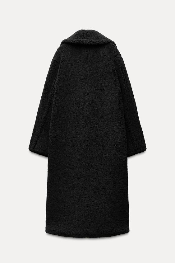 Long Winter Coat for Women Made of Soft Teddy Fabric with Lapel Collar and Side Pockets for Extra Warmth and Comfort