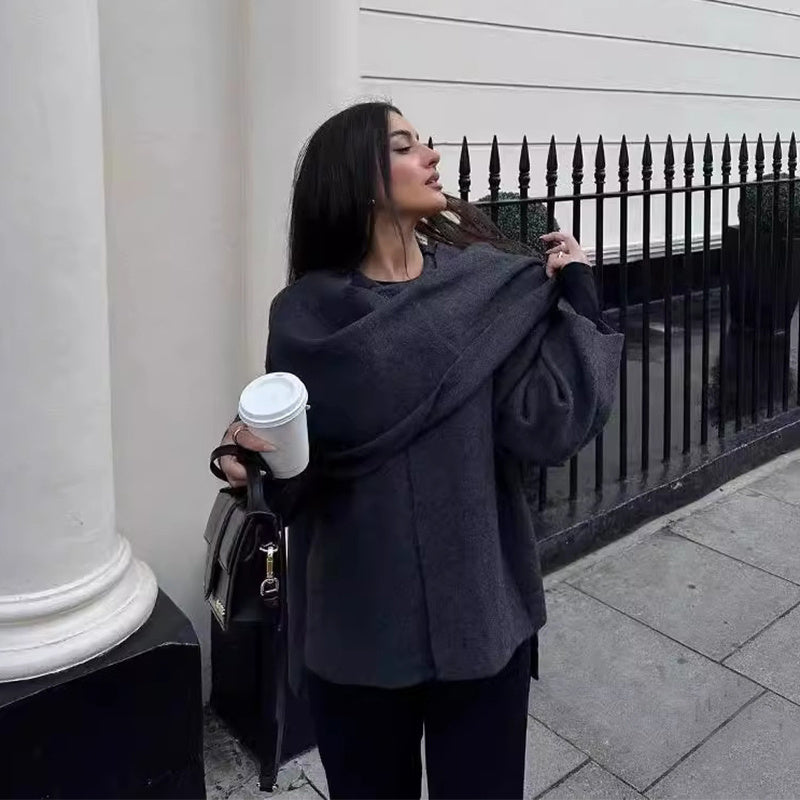 Oversized wool coat with button closure and luxury lining